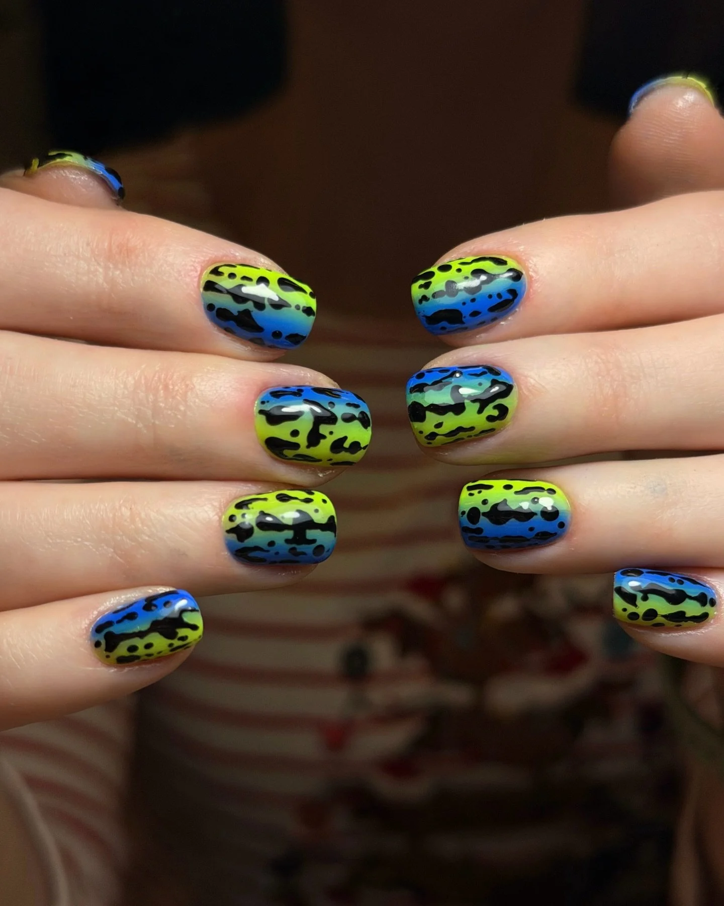 🐸🌀🧪🍀💙🫐🪲🔹 

A flawless manicure with a whimsical design ✨🖌️!

by our talented fairy #selfish_vicky 

Book for category 3 art to get this look. 

.
.
.
.
#frognails #frognailart #nailartlondon #nailartspitalfields #nailarteastlondon #nailartsh