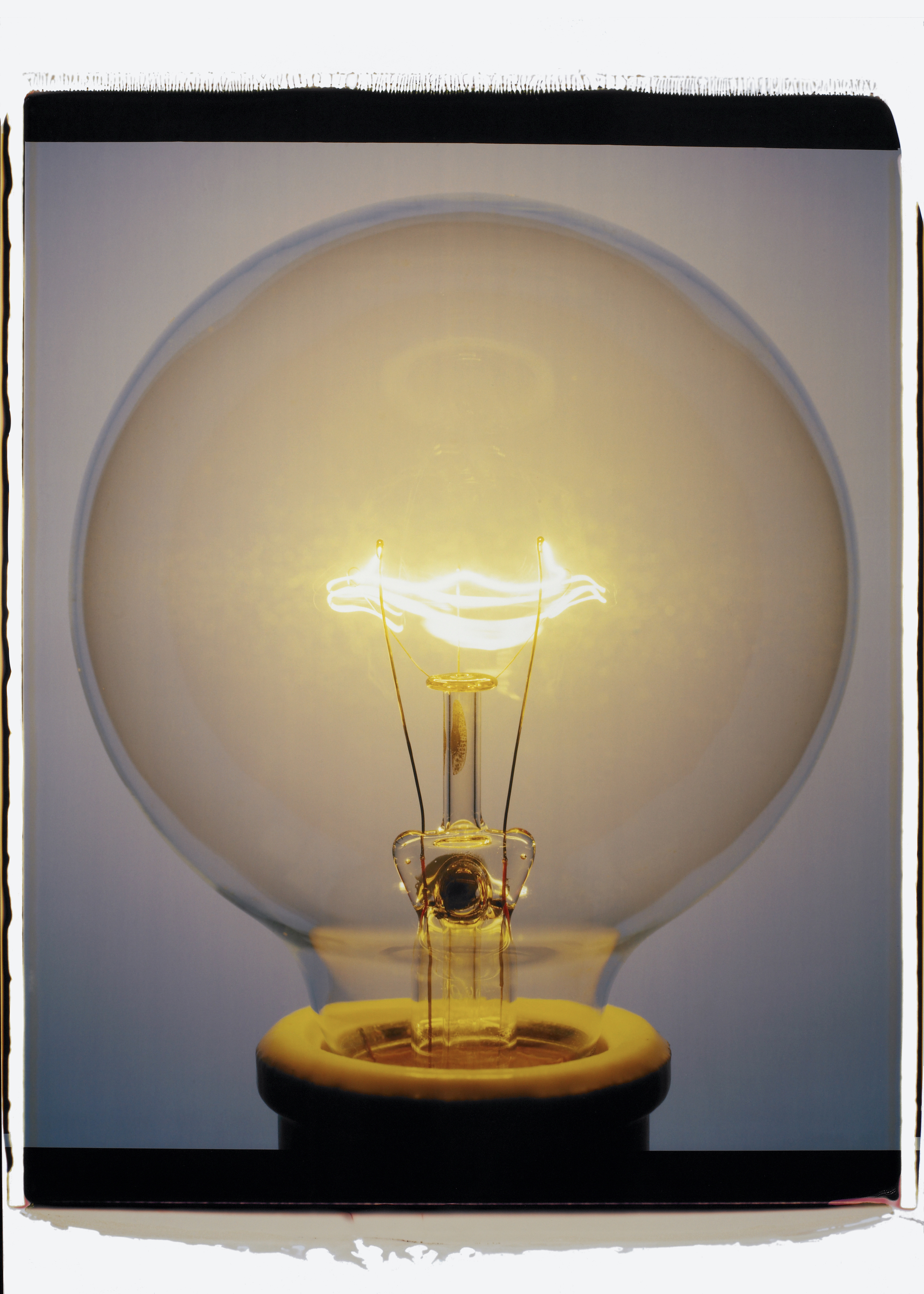 "Light Bulb 015YBc, 2007," Color Polaroid.