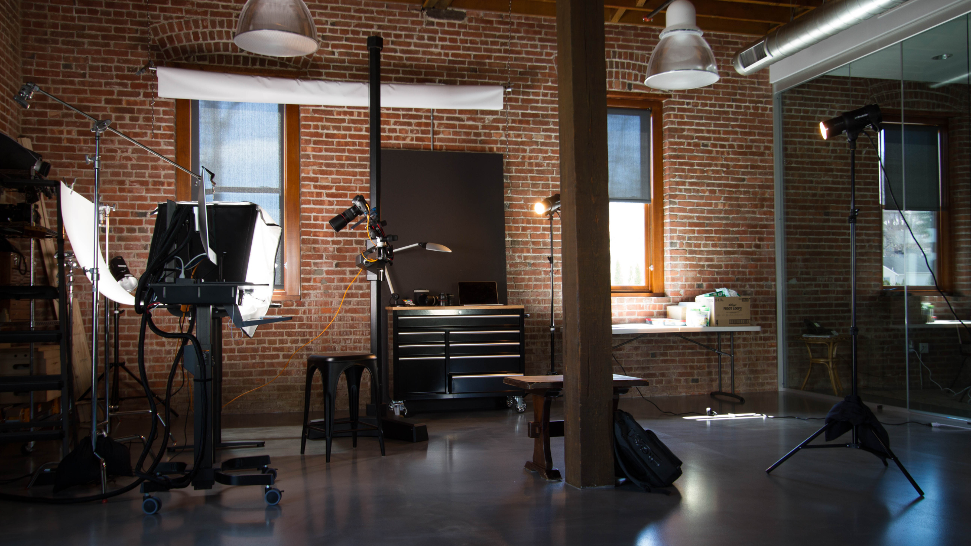 Professional research facility designed as a dual-purpose production studio, equipped with lighting, cameras, and interview setup for capturing high-quality consumer insights content.