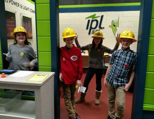 Posing with hardhats at "Indianapolis Power and Light."