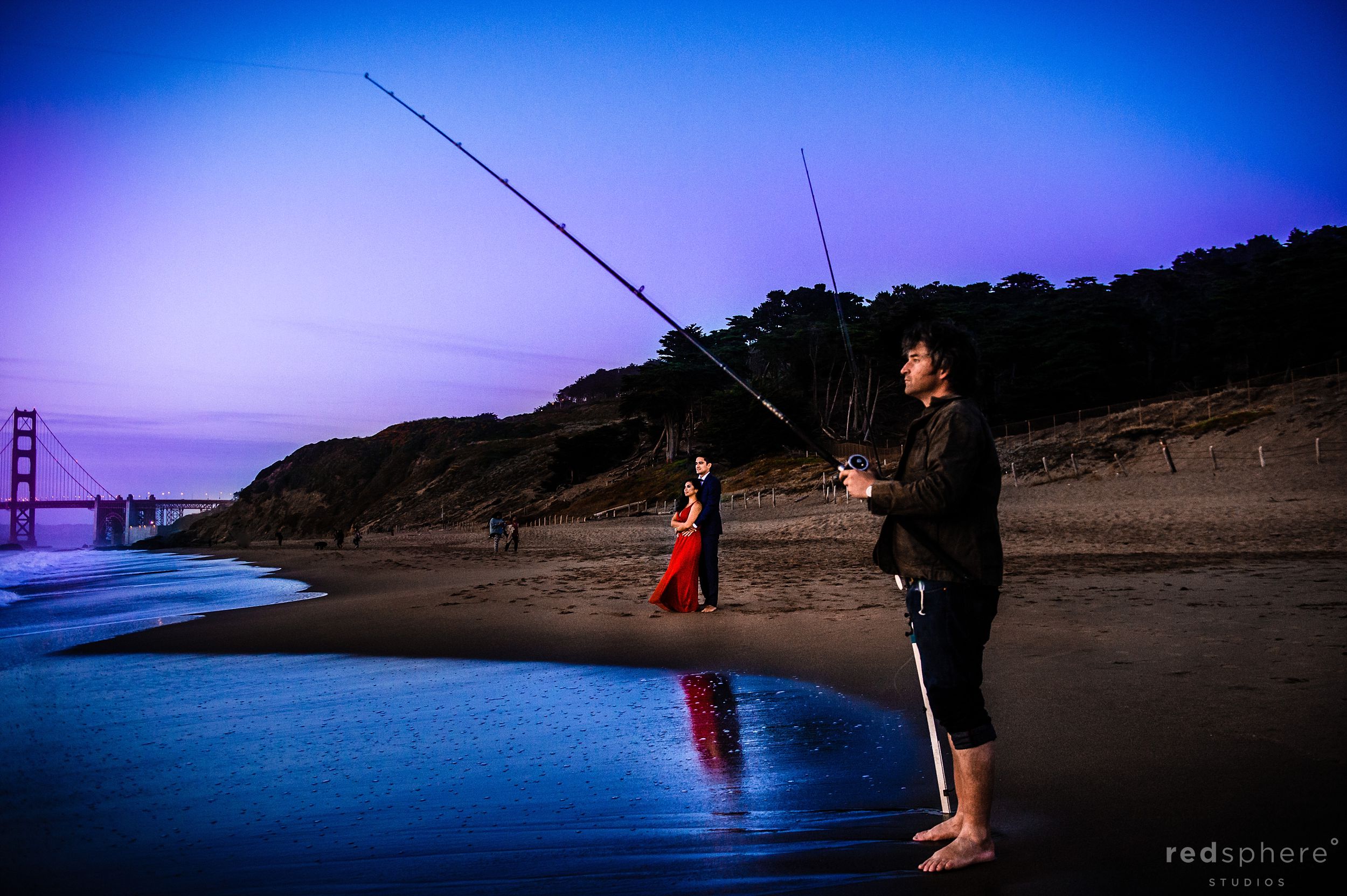 Fisherman and Couple Reflection at San Francisco's Baker Beach Engagement