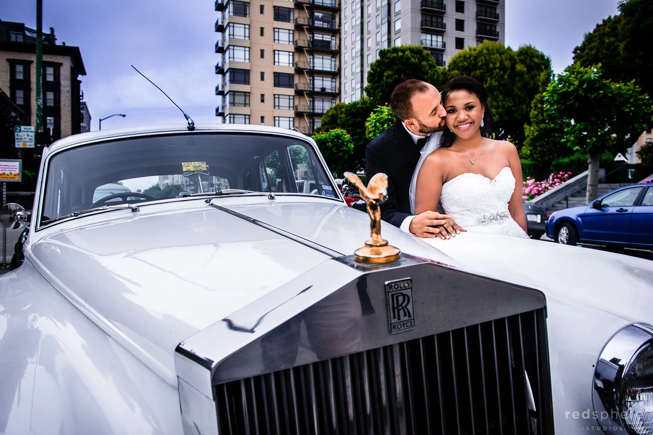 Groom Kisses Bride Next to White Vintage Car, Nob Hill San Francisco