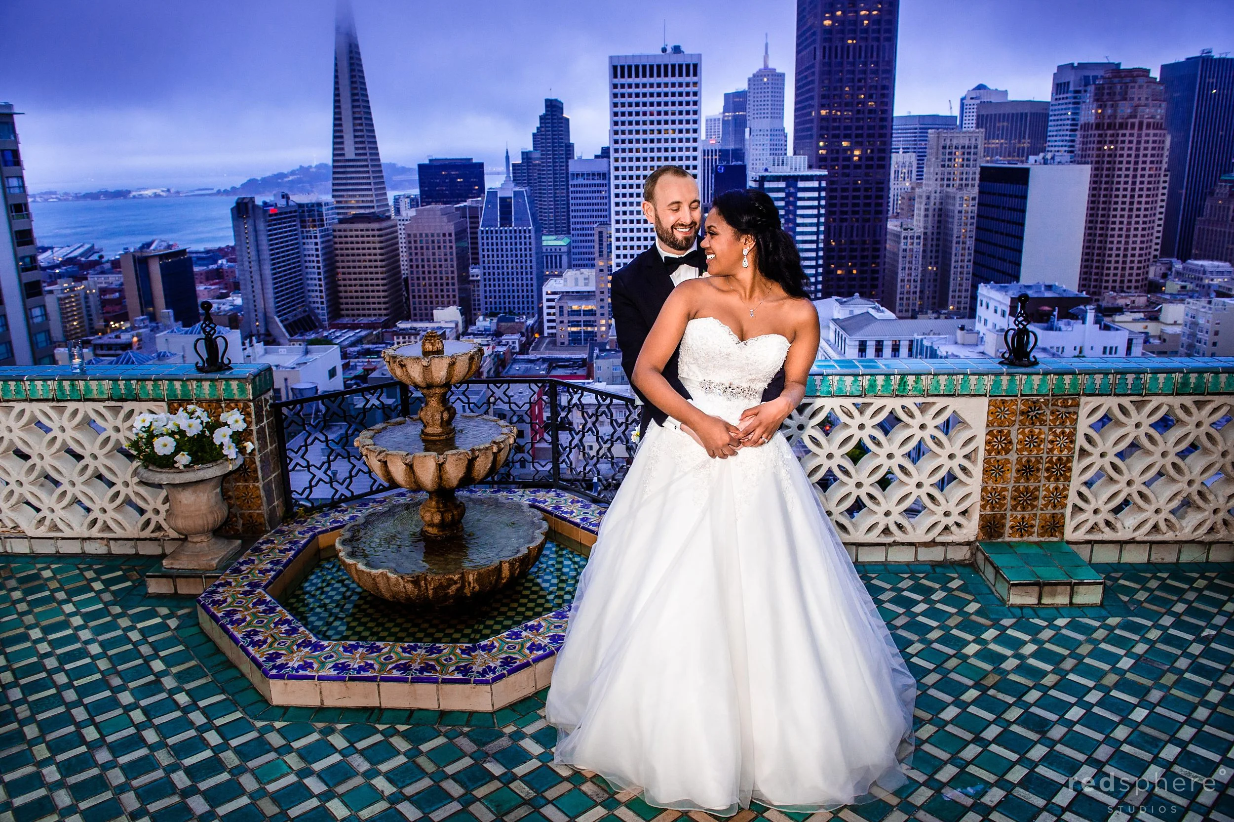 Bride and Groom With San Francisco Skyline Background, Fairmont Hotel Penthouse Suite