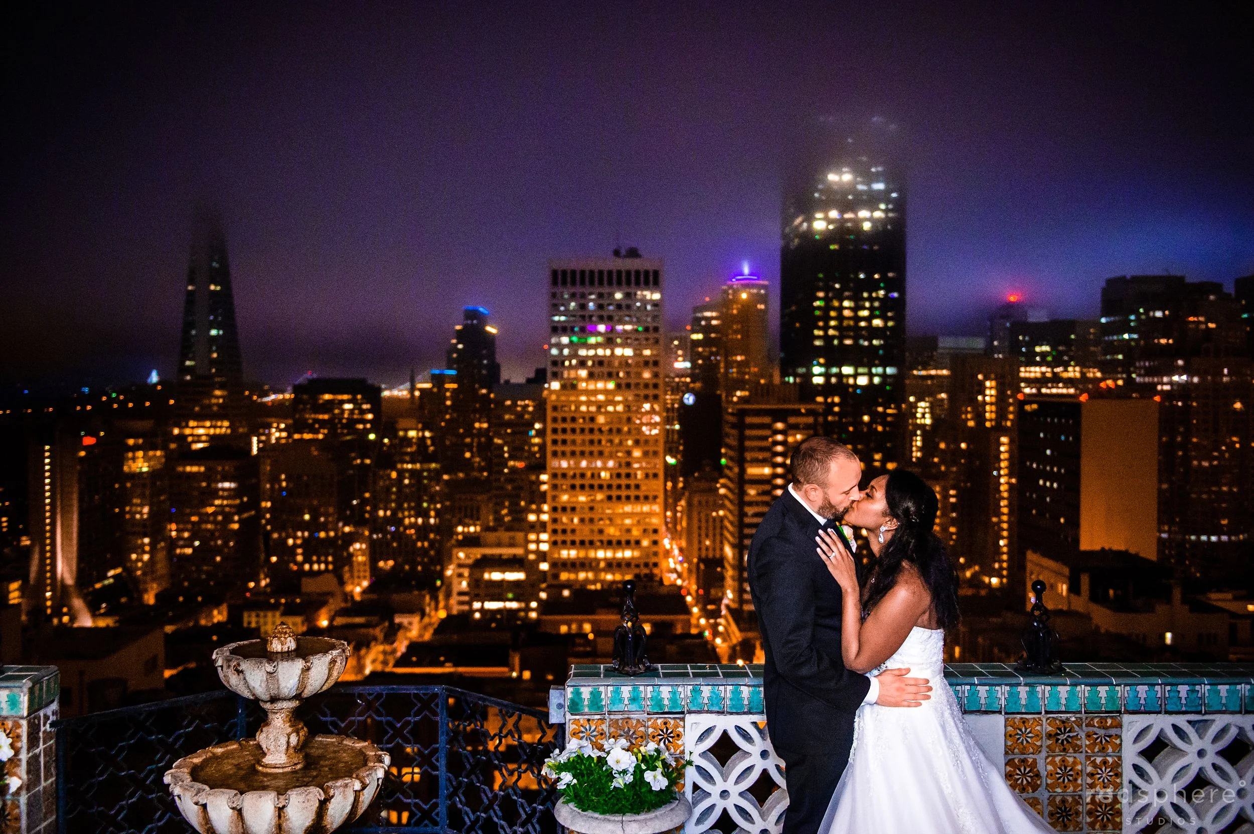 Wedding Kiss Against the Dark San Francisco Skyline, Fairmont Hotel Penthouse Suite