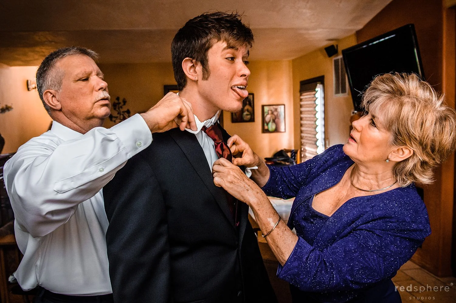 Family Friends Adjusting Their Suit for Wedding Ceremony