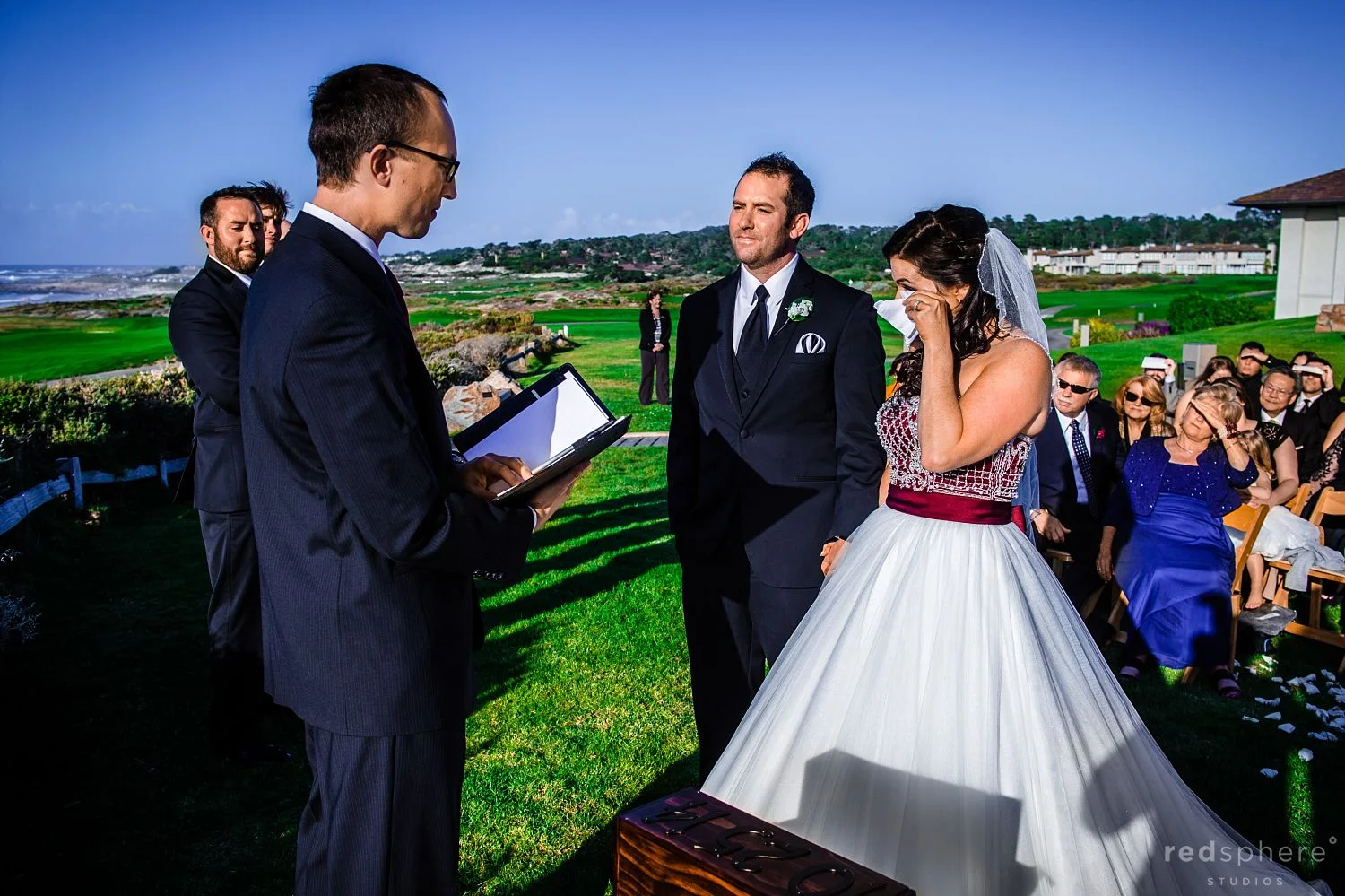 Bride Tearing Up Next to Groom as Officiant Speaks