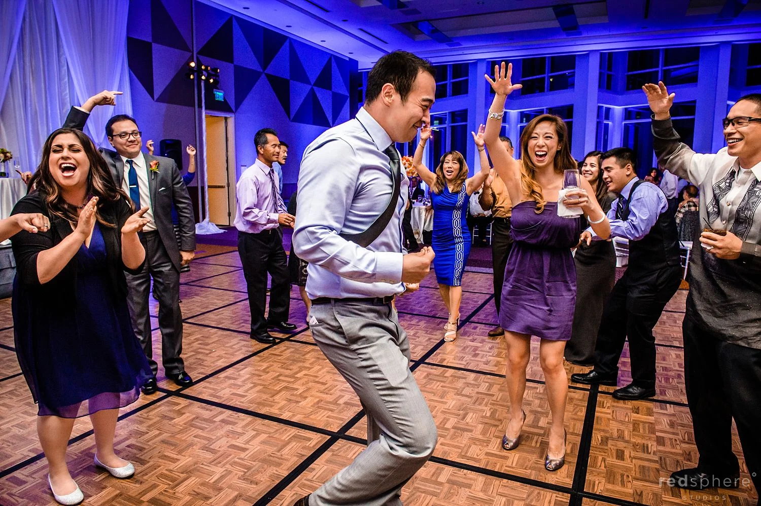 Guests Dance and Cheer Each Other on at Intercontinental Hotel Wedding Reception