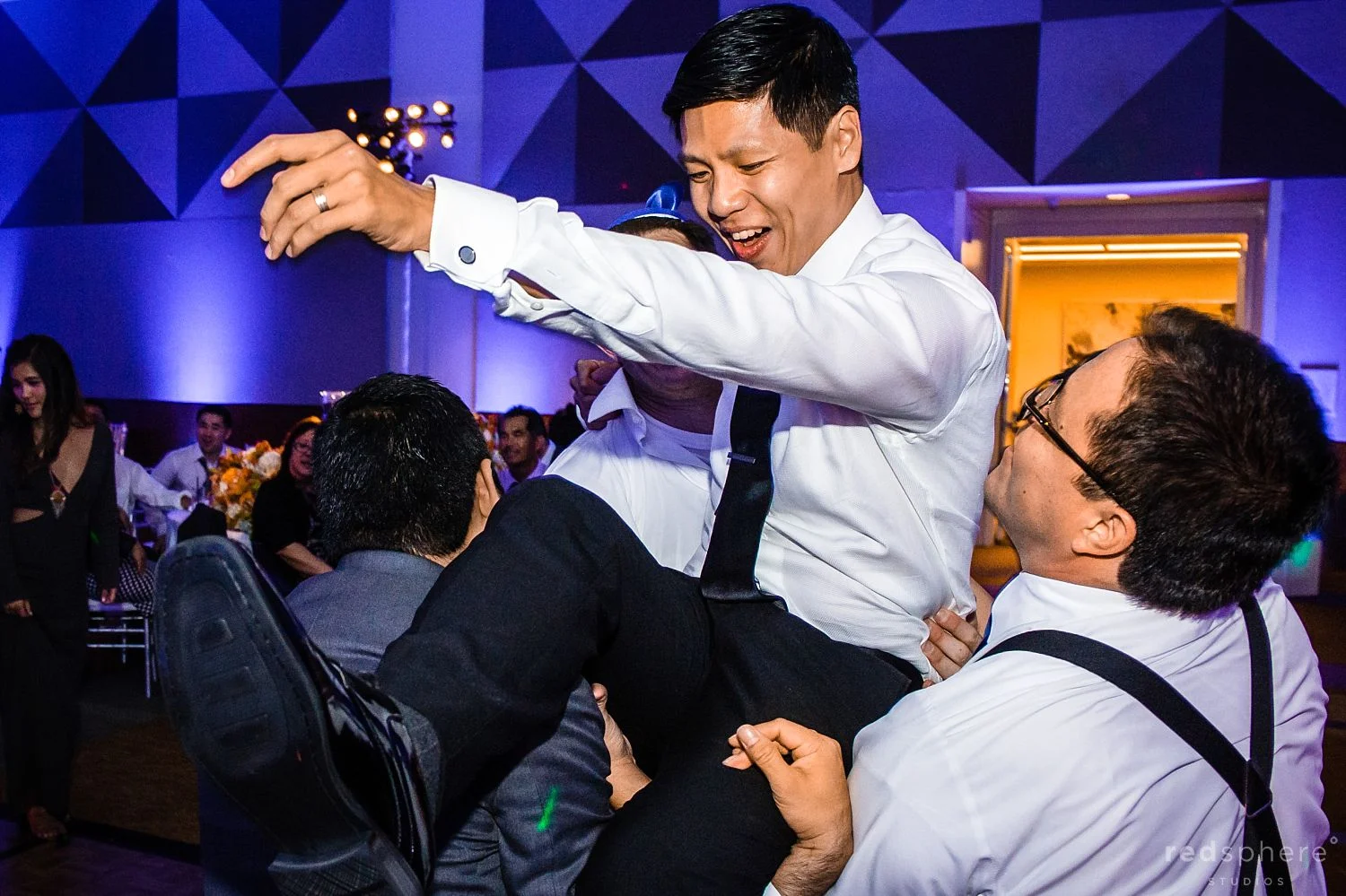 Groom Crowd Surfing at Wedding Reception, San Francisco
