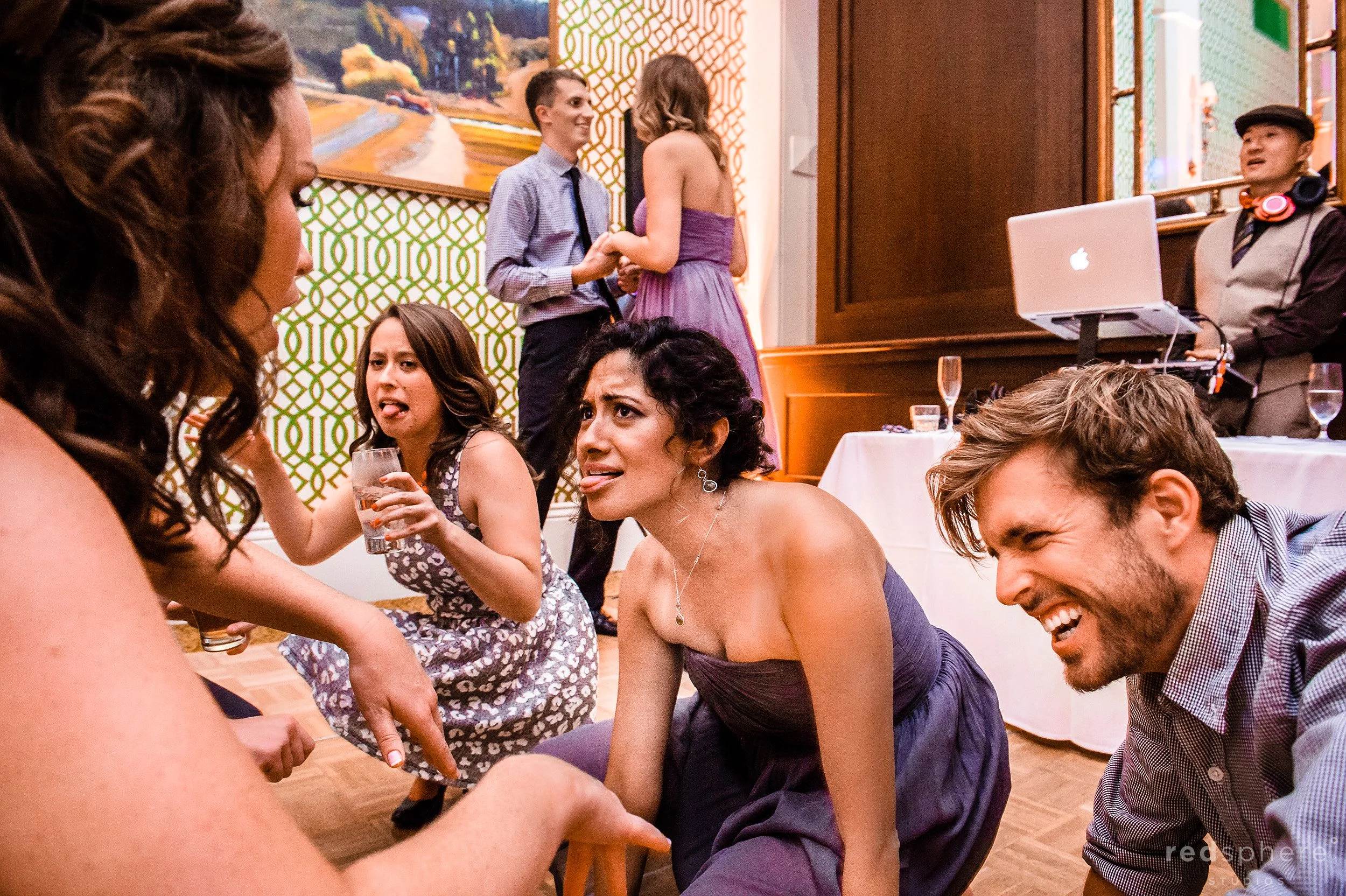 Guests Make Silly Faces and Laugh at Wedding Reception