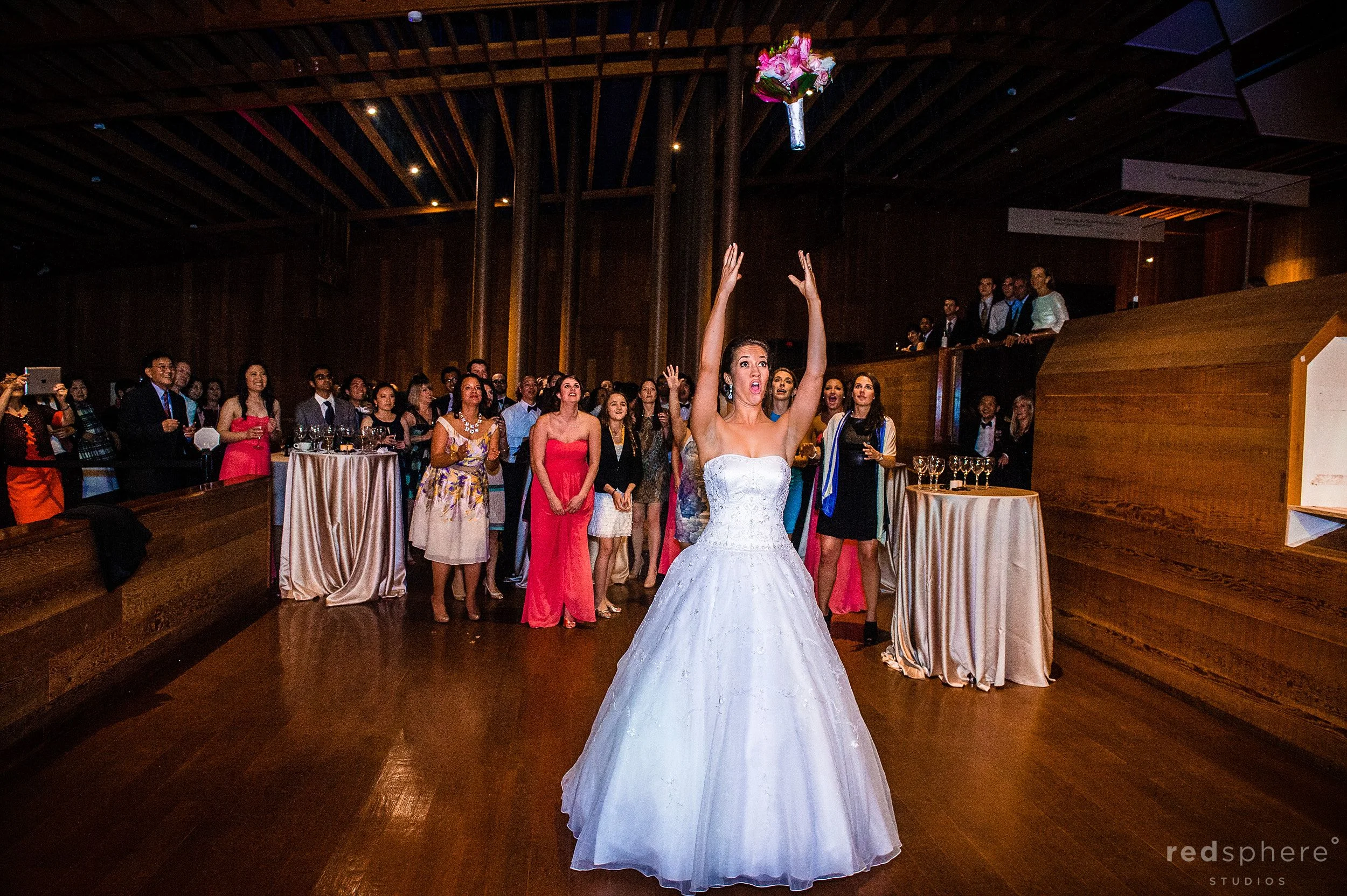 Bride Throws Her Bouquet Into the Air, Dance Floor Spotlight