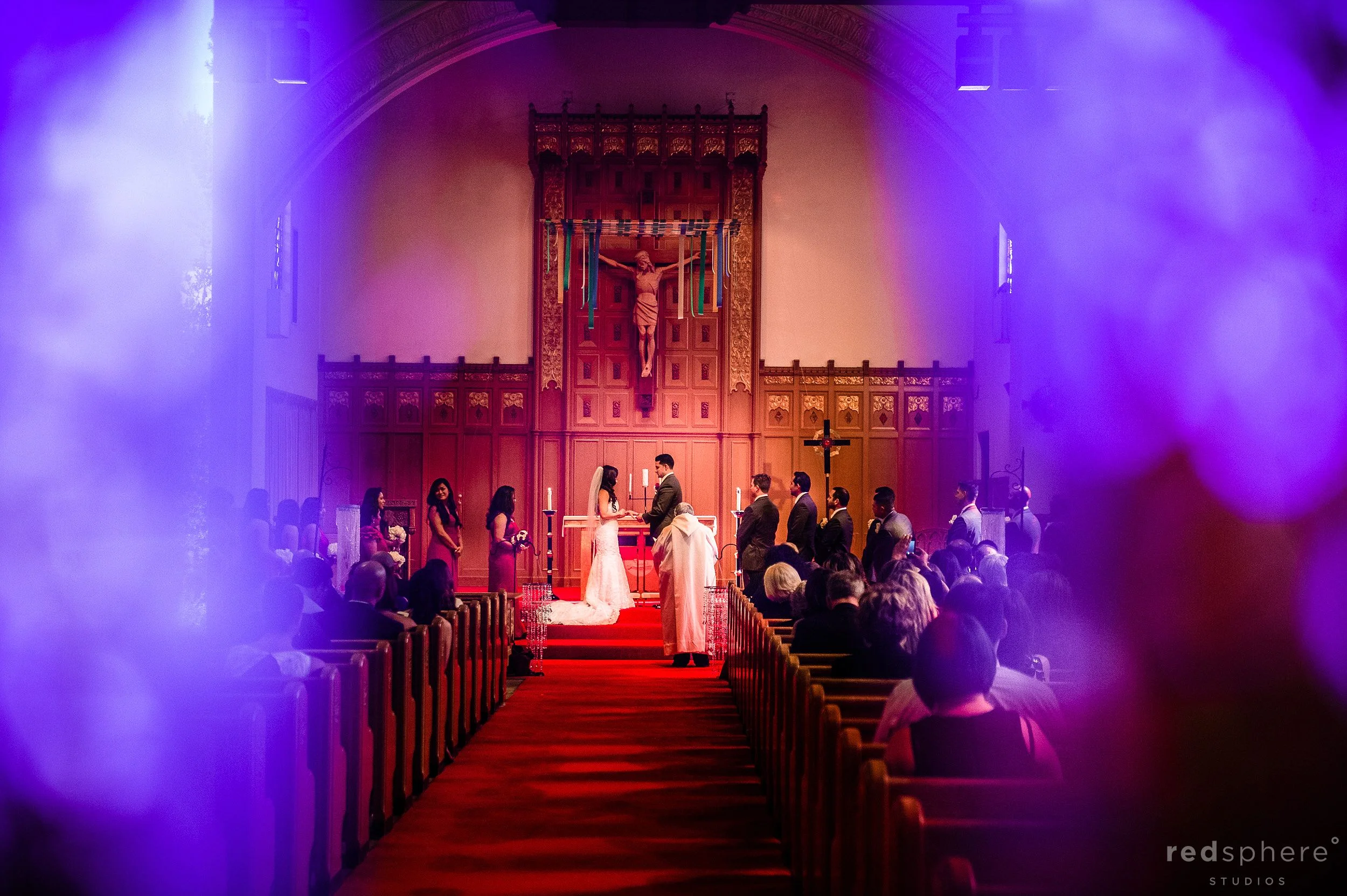 Bride and Groom Share A Special Moment, Holding Hands While Vows Are Being Said, Santa Maria Church, Orinda, CA