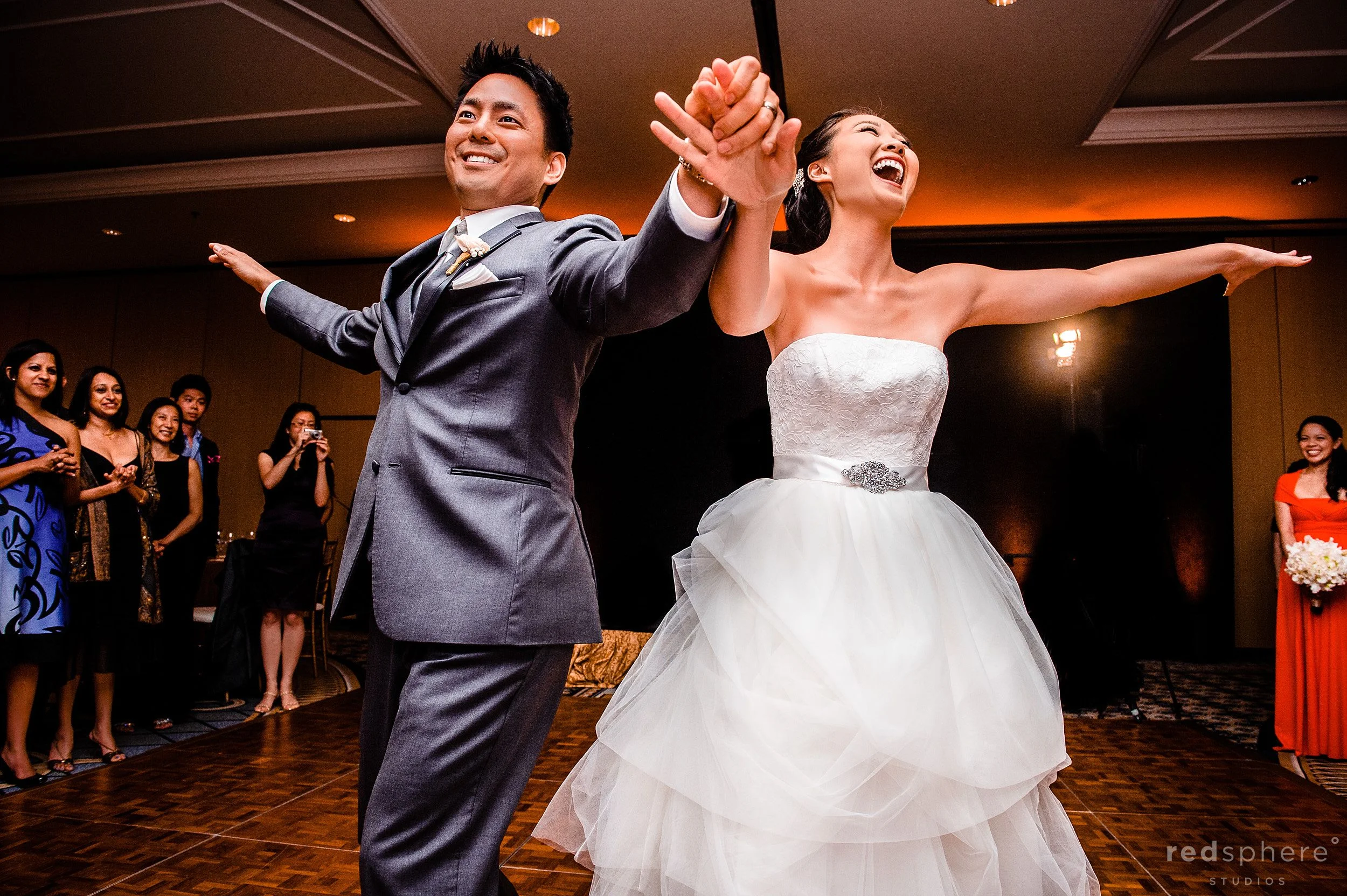Bride and Groom Spreading Their Wings While Dancing The Ritz Carlton, Half Moon Bay, CA