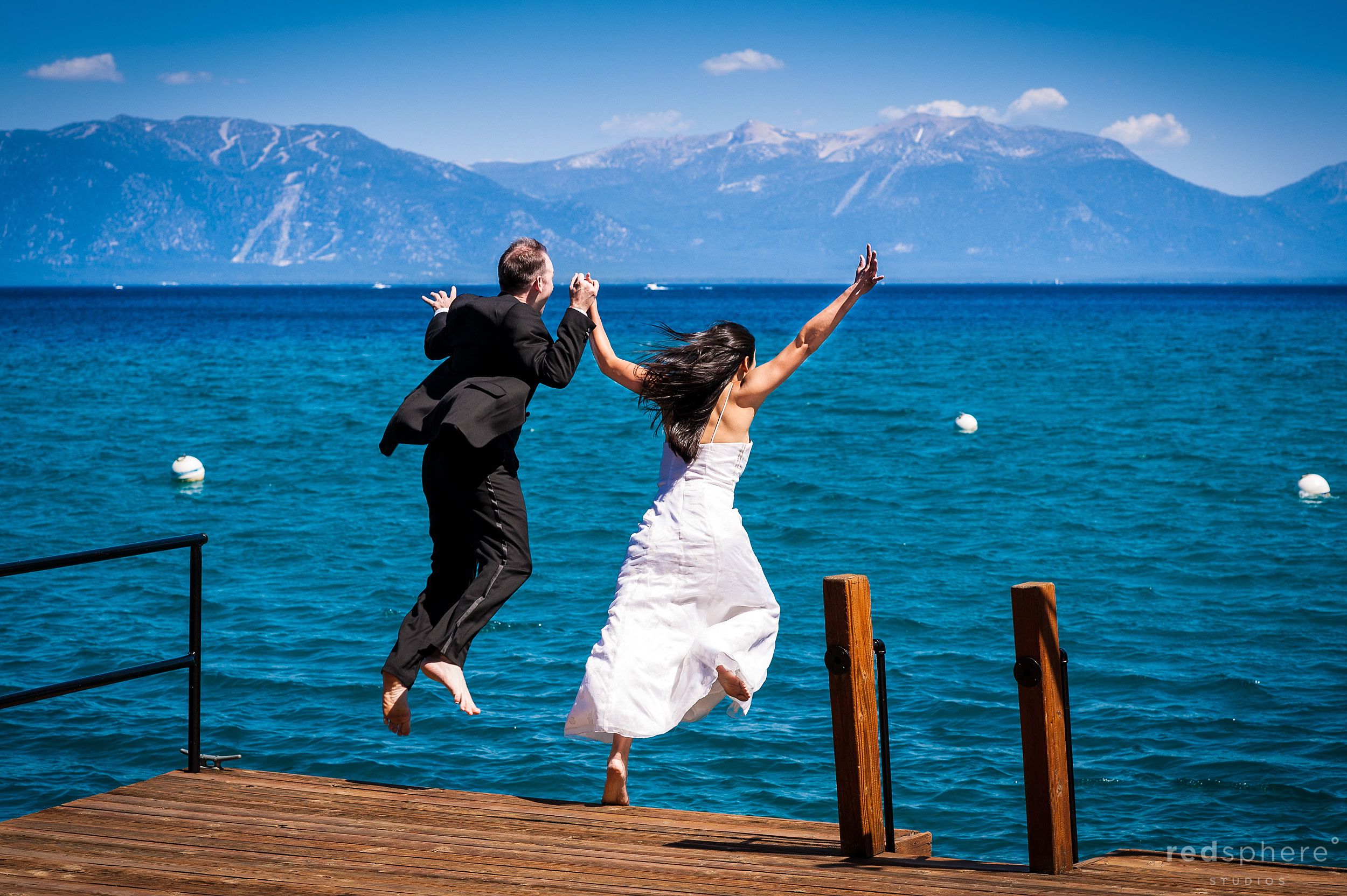 Couple Jump of Dock at Lake Tahoe, Fun Engagement Sessions at Lake Tahoe