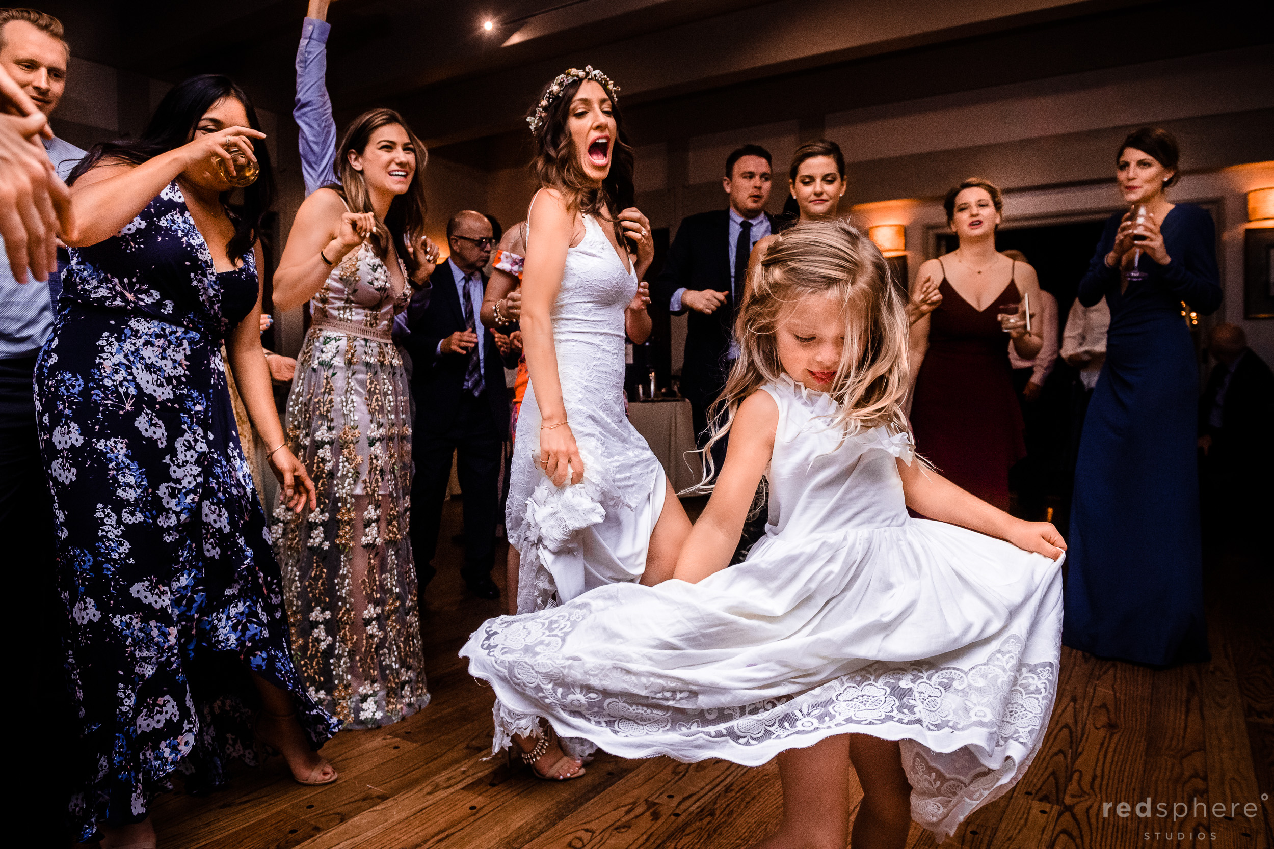 Wedding guests dancing during a wedding reception at Harvest Inn By Charlie Palmer, St. Helena, Napa Valley