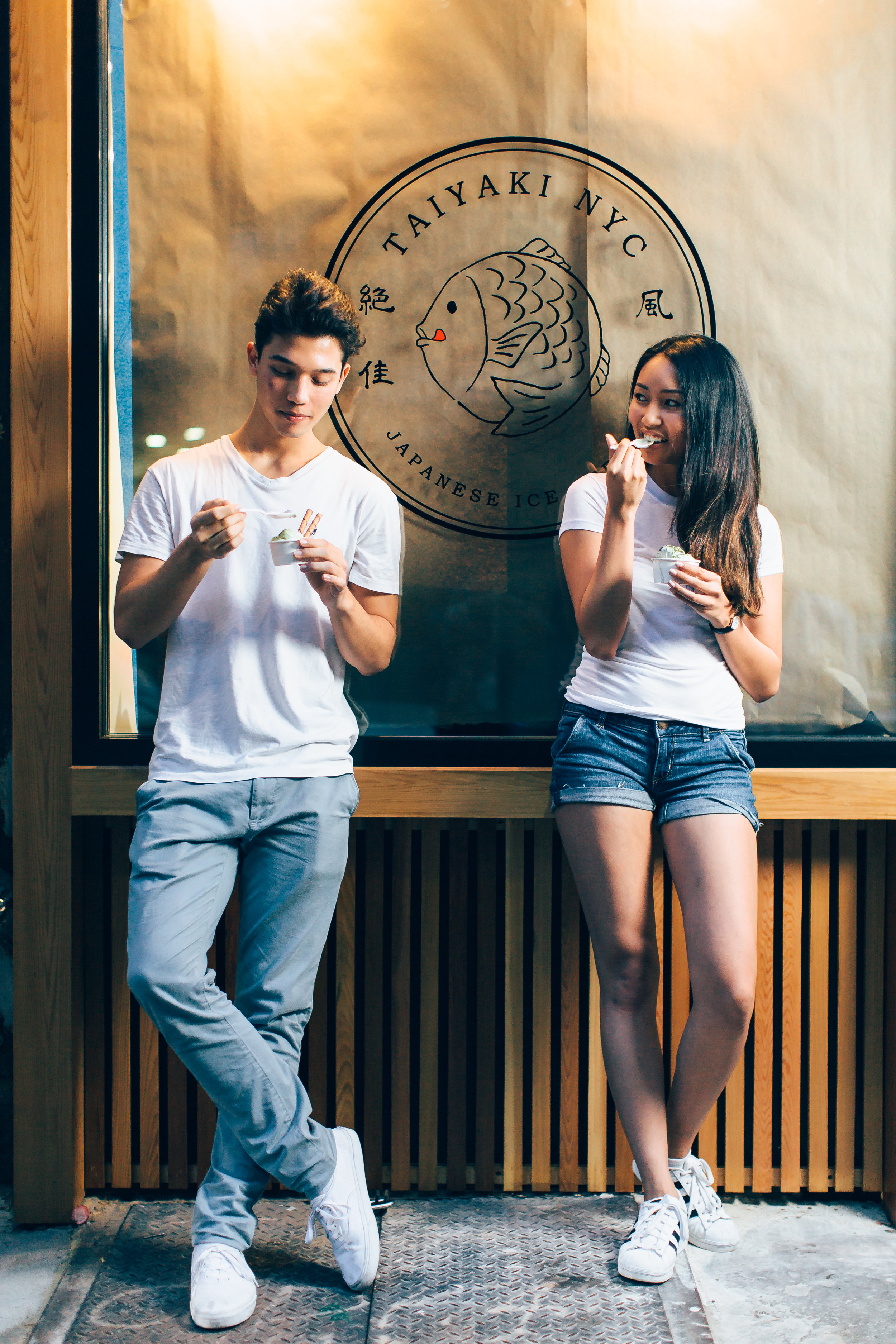 Kohei (left) and Karen (right) posing for a photoshoot.