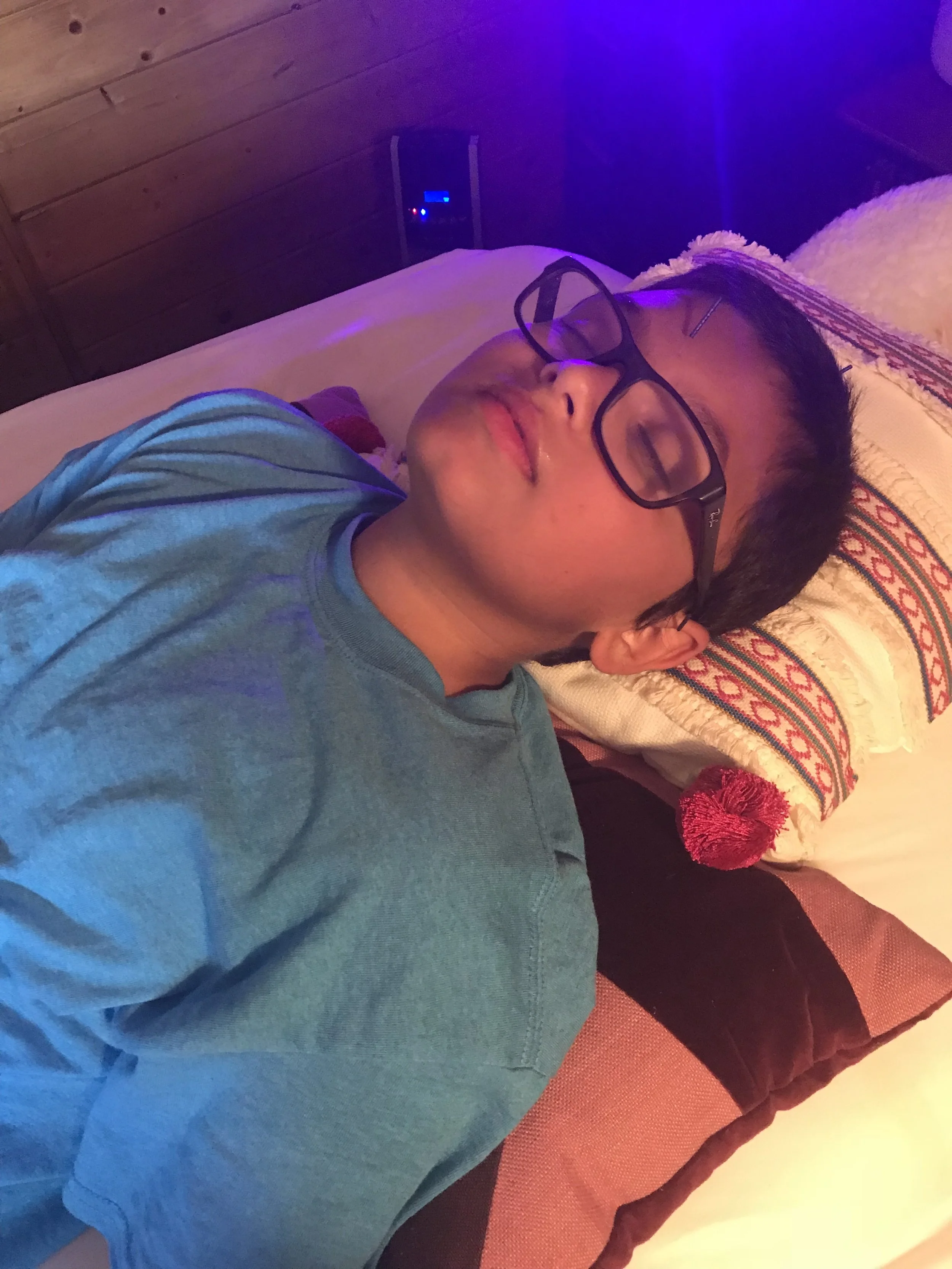Young Boy Resting Peacefully During Acupuncture