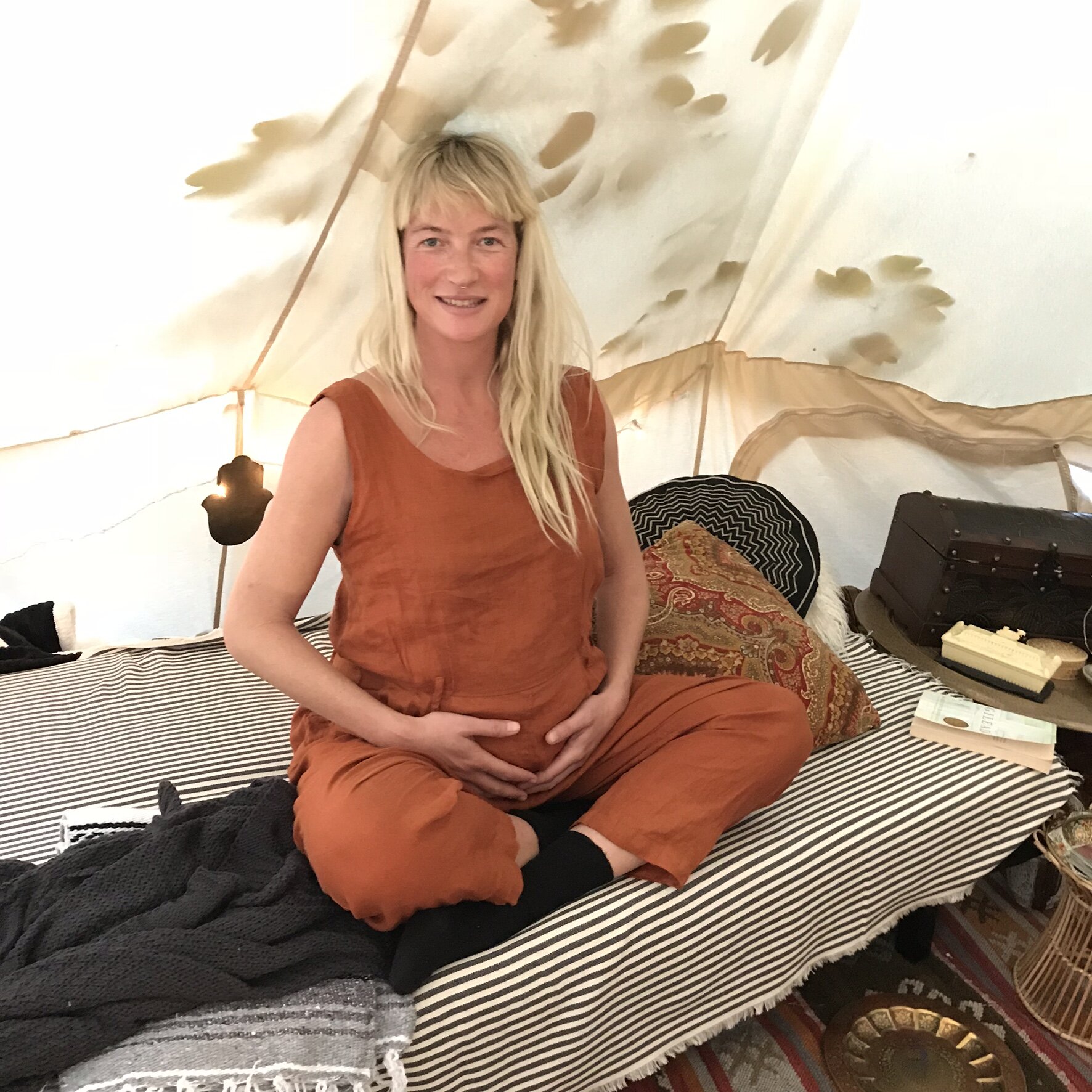 Pregnant Mother Preparing For Labor With Acupuncture 