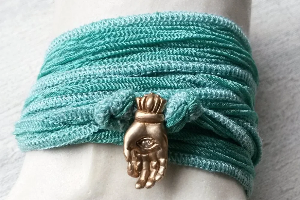 Mundra_small_charm_on_wrist_cropped_1024x1024.jpg