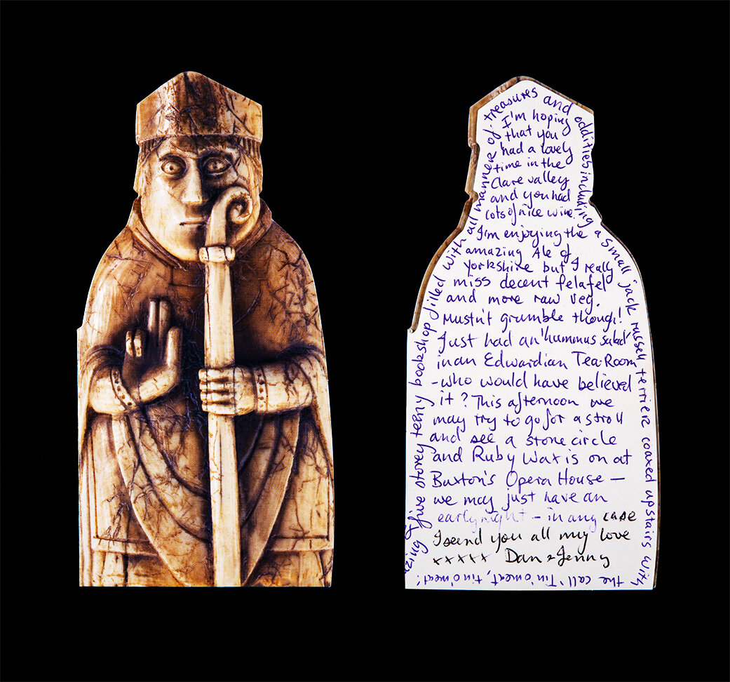    Duologue    Dan's Card: A Tale of Time &amp; Travel Sent From the UK to Australia  2019  (Image on card: Scandinavian 12th-13th century ivory bishop chess-piece found on the island of Lewis in 1831, National Museums Scotland)	  90cm x 96.5cm  Arch