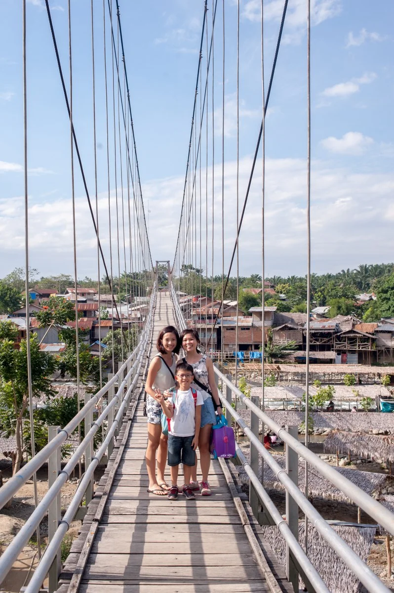 Some of these city kids probably have never crossed a suspension bridge before. The tree top walk is actually higher, but the few missing wooden planks on this bridge make the walk a bit more interesting.