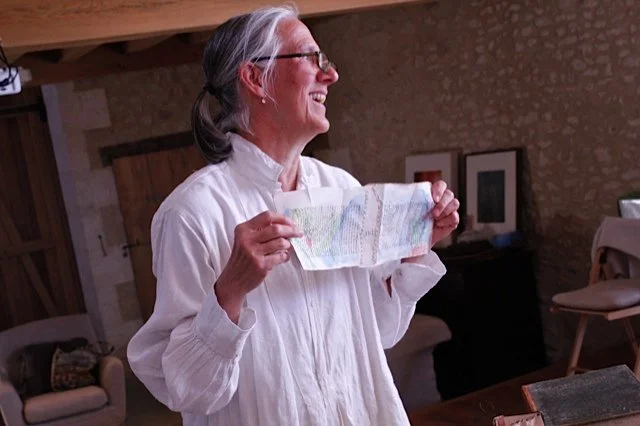 A workshop leader giving a demonstration during a creative workshop at Les Soeurs Anglaises