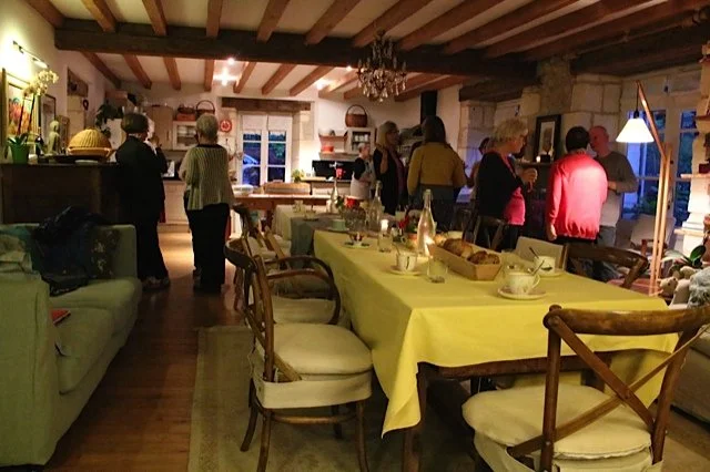Participants sharing a meal during a residential creative retreat