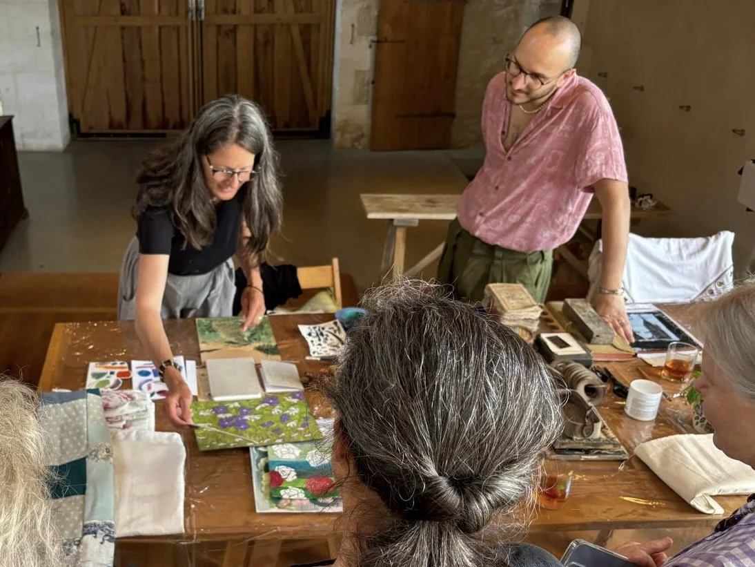 Creative workshop participants working together in the studio at Les Soeurs Anglaises in South West France