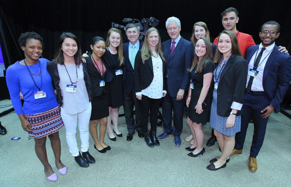 Sam (far right) with Bill and Chelsea Clinton at the Clinton Global Initiative University in April 2016