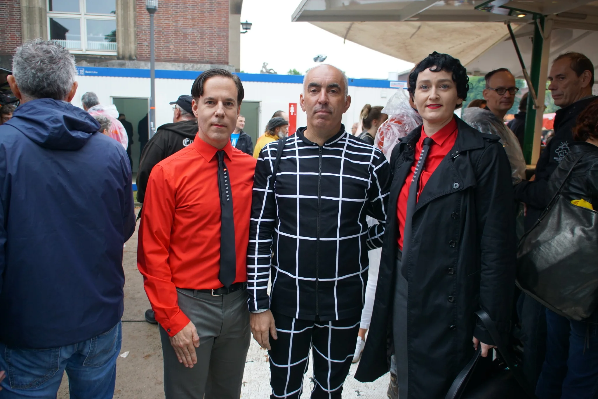 Three Kraftwerk fans attending the legendary open-air concert in summer 2017 in Ehrenhof. Photo Credit: Les Jordan