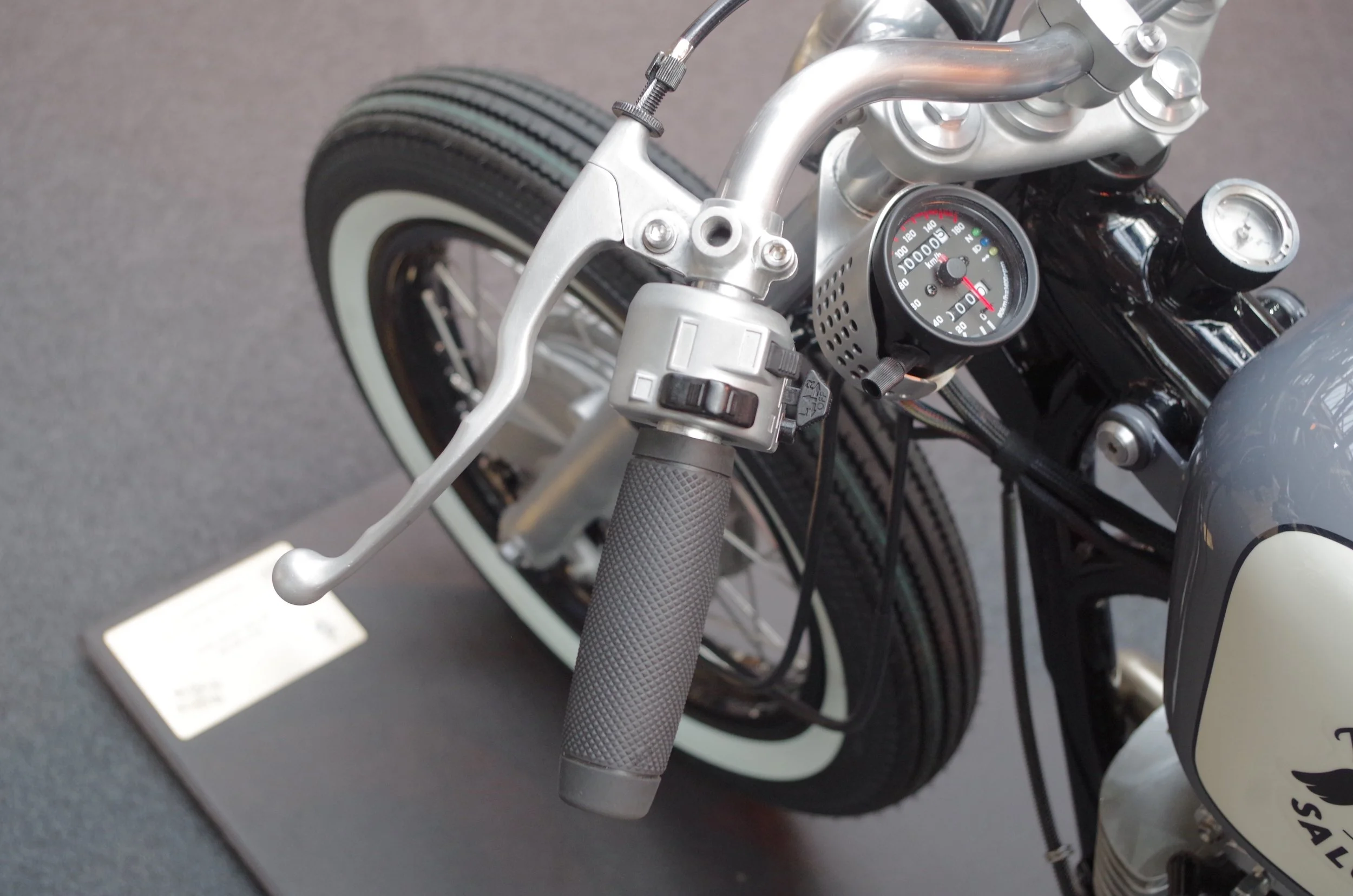 Neat fork mounted speedo basket is a one-off fabricated by Jamie