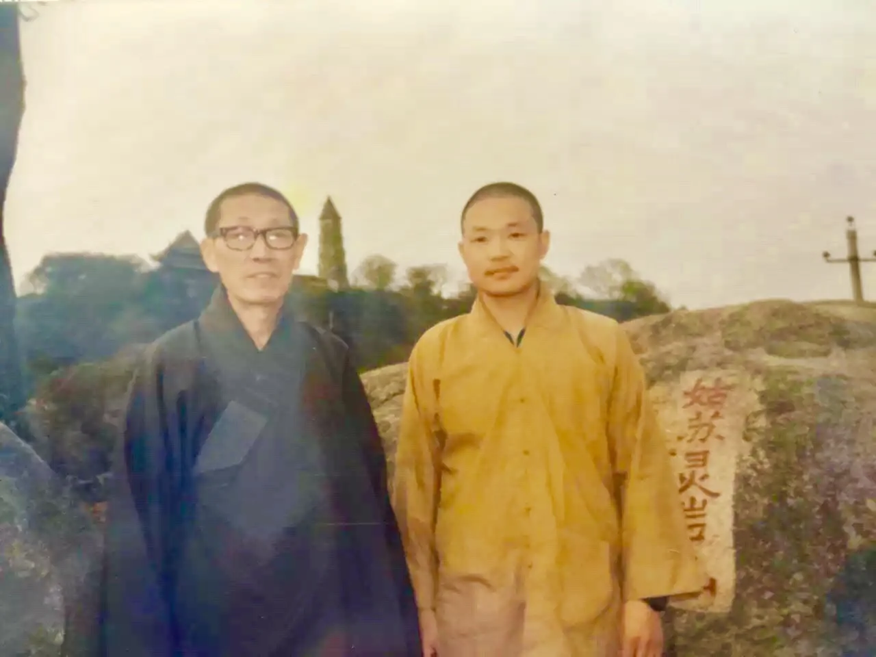 Chairman Mr. Shi with Venerable Xing Xue in Ling Yan Mountain at the time Mr. Shi was a teacher in Ling Yan Buddhist University.