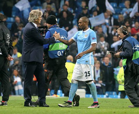 MANCHESTER, ENGLAND - APRIL 12: Fernandinho of Manchester City react with Manuel Pellegrini after the victory during the UEFA Champions League Quarter Final second leg match between Manchester City FC and Paris Saint-Germain at the Etihad Stadium on April 12, 2016 in Manchester, United Kingdom. (Photo by Xavier Laine/Getty Images )