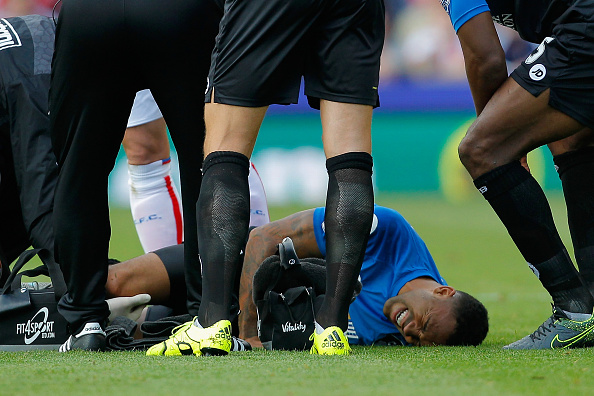 STOKE ON TRENT, ENGLAND - SEPTEMBER 26: Callum Wilson of Bournemouth lies on the ground after his injury during the Barclays Premier League match between Stoke City and A.F.C. Bournemouth at Britannia Stadium. (Photo by Malcolm Couzens/Getty Images)