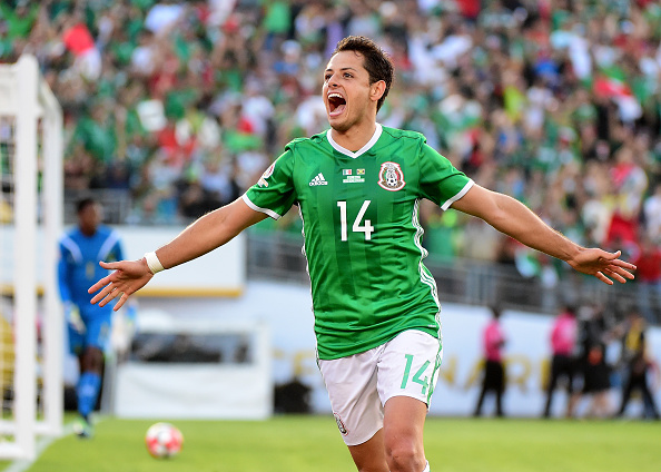 PASADENA, CA - JUNE 09: Chicharito #14 of Mexico celebrates after his goal in front of Andre Blake #1 of Jamaica to take a 1-0 lead during Copa America Centenario at the Rose Bowl on June 9, 2016 in Pasadena, California. (Photo by Harry How/Getty Images)