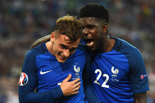 Umtiti (R) is one of many who've made their name in Ligue 1 before moving elsewhere.  (Photo by PATRIK STOLLARZ/AFP/Getty Images)