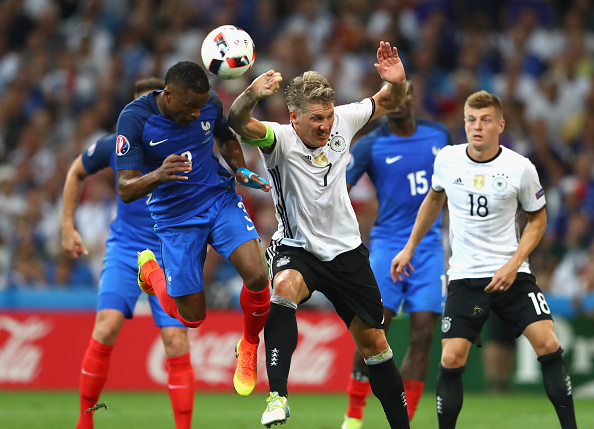 Schweinsteiger decided to contest against his teammate Boateng's handball against Italy. (Photo via  Getty Images )
