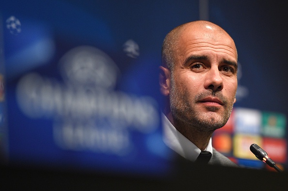 How will Guardiola set up his team in this game? (Photo by LLUIS GENE/AFP/Getty Images)