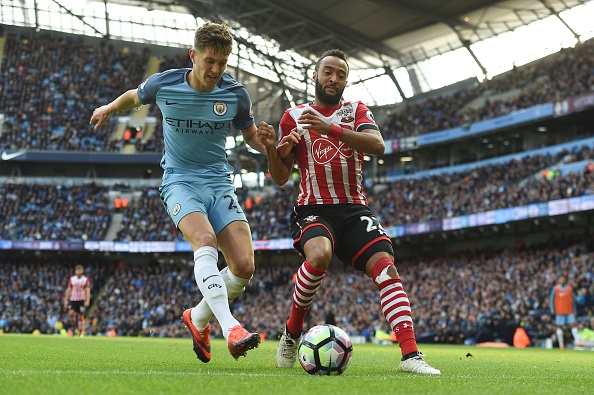 Stones gave away possession which eventually led to a goal in City's last game vs. Southampton. (Photo by Paul Ellis/AFP/Getty Images)