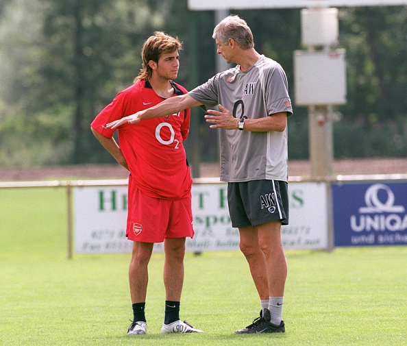 A young Fabregas receiving instructions from Monsieur Wenger. (Photo by Stuart MacFarlane/Arsenal FC via Getty Images)