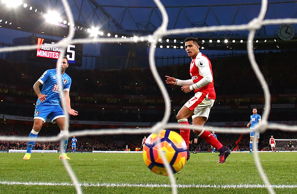 Sanchez scores his side's third goal, ending the fightback that Bournemouth had started. (Photo by Clive Rose/Getty Images)