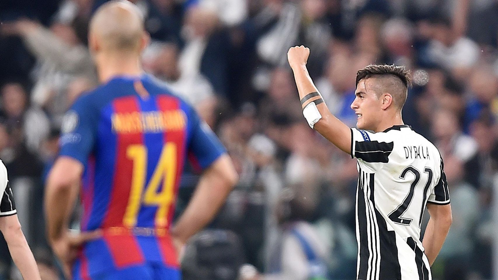 Dybala celebrates after scoring against Barcelona. (Photo via Getty Images)