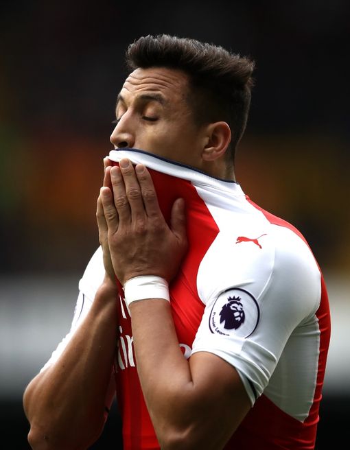 Sanchez cuts a frustrated figure at Arsenal of late. Should he stay or should he go? (Photo via Getty Images)&nbsp;