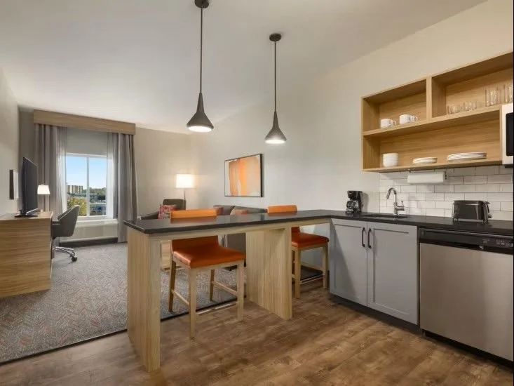 2026 Candlewood Suites Oakwood GA Kitchen Peninsula Millwork and Quartz 4.jpeg