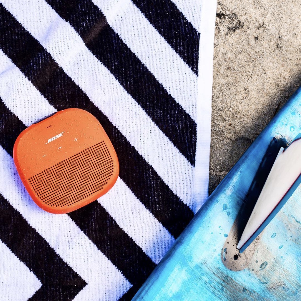 Boses' Soundlink Micro doesn't scare at a little sand or spray at the beach. Photo cred instagram: @bose
