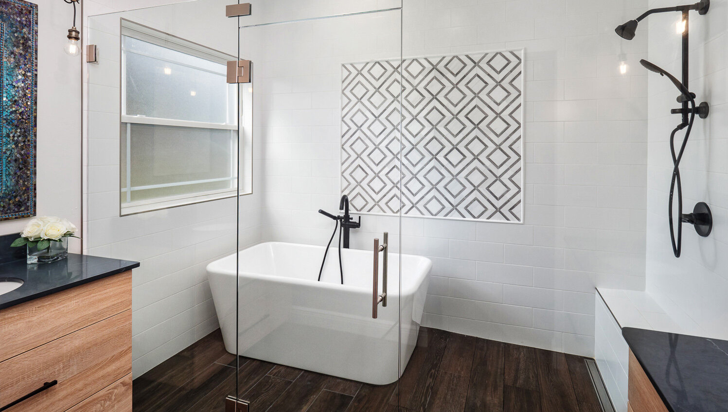 bath design with freestanding tub inside the shower enclosure