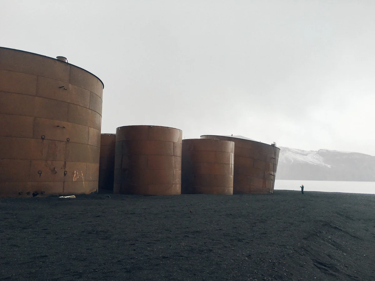 Massive metal barrels that at one time were used to store oil produced from whale fat