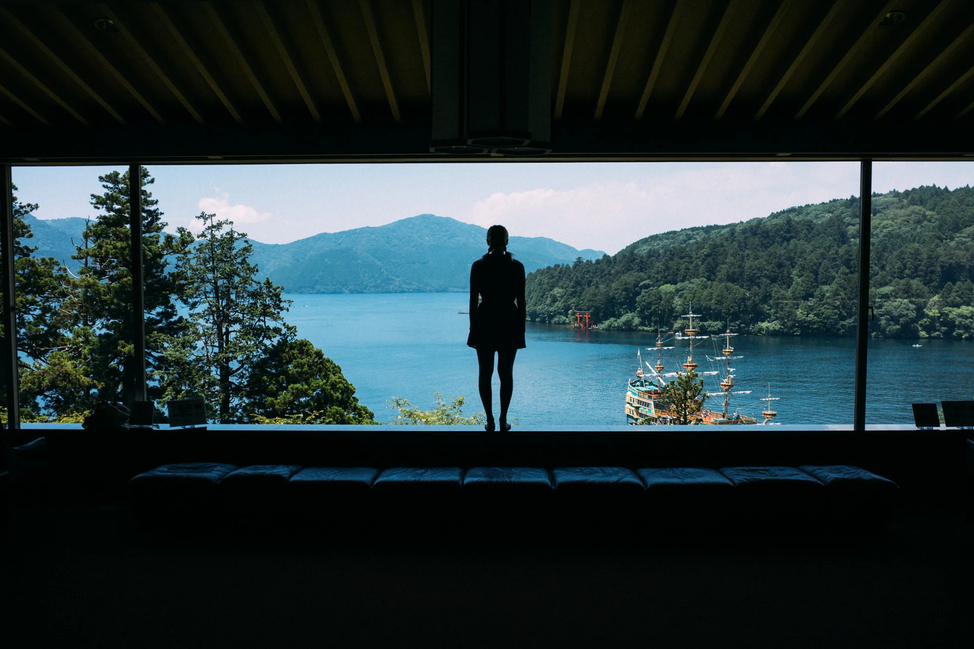 Something is missing from this photo: Mt Fuji. The clouds above the mountains are obscuring Fuji in this perfectly framed view at the Narukawa Art Museum.