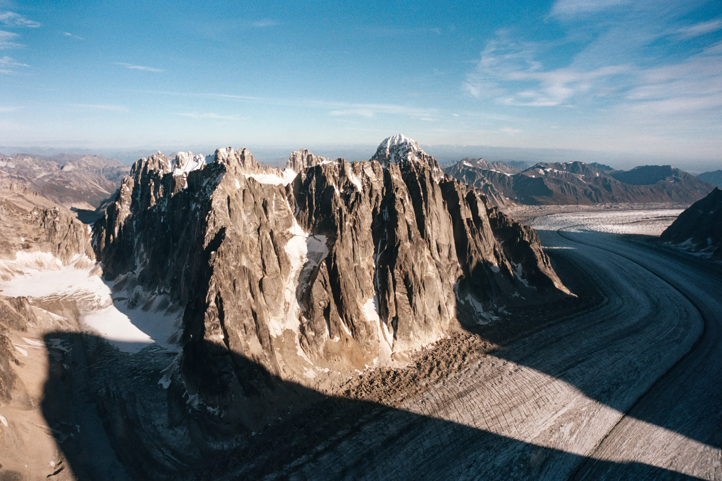 Flying down the mountain along Ruth Glacier. This is an area called “Little Switzerland”, popular among rock climbers.