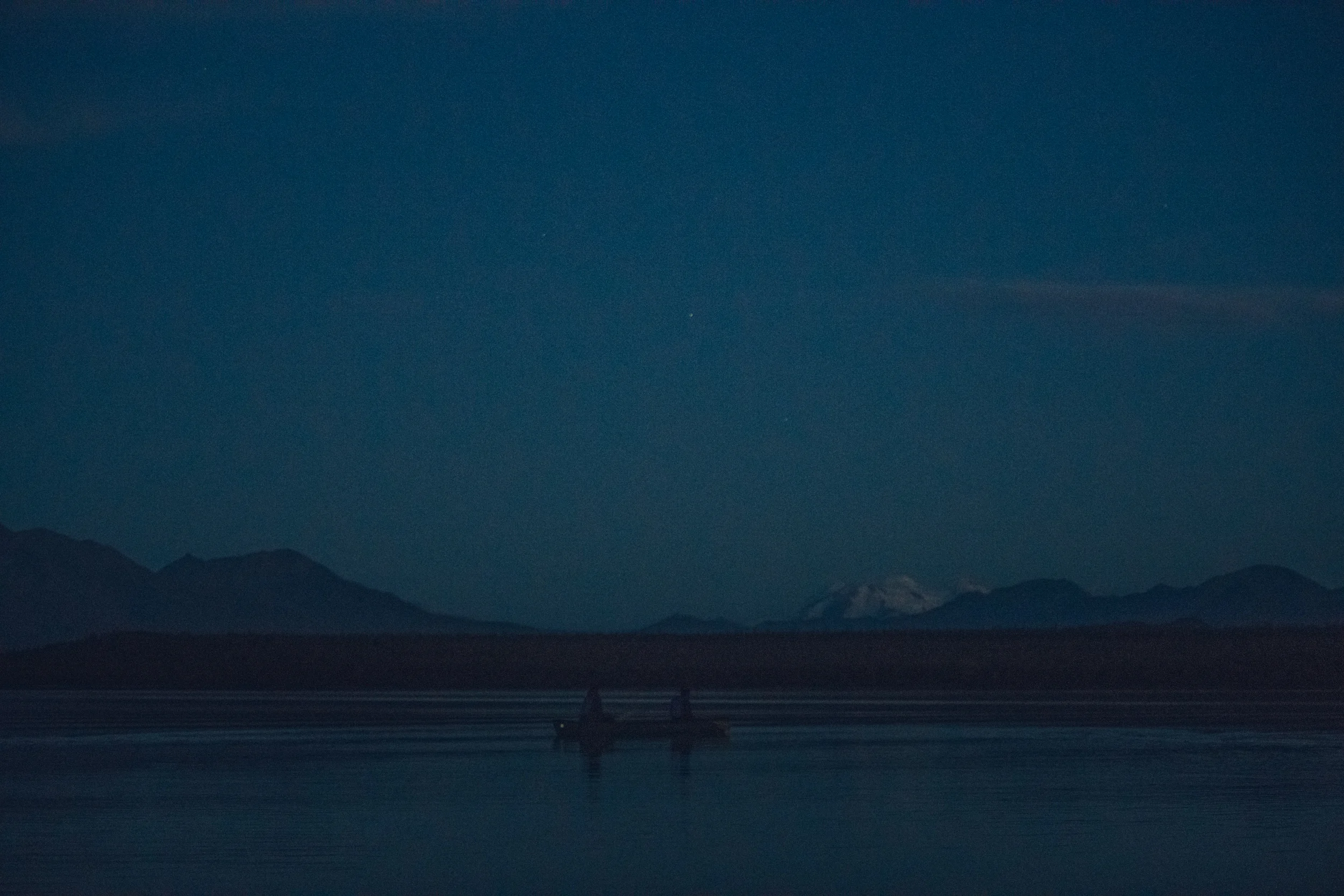 After dusk, Kitao and Paul canoeing on Naknek Lake.