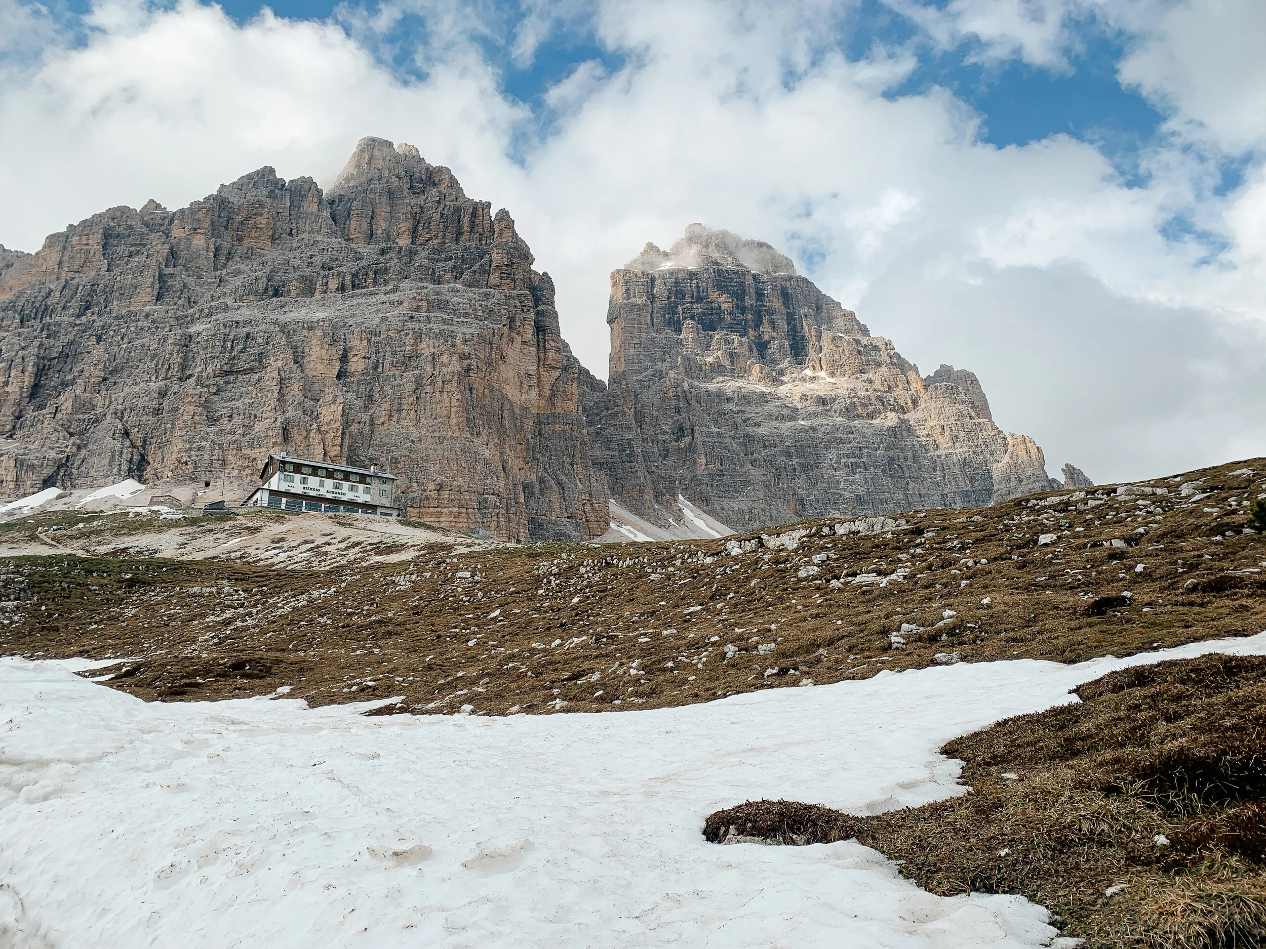 Rifugio Auronzo sits below the back side of the Tre Cime.